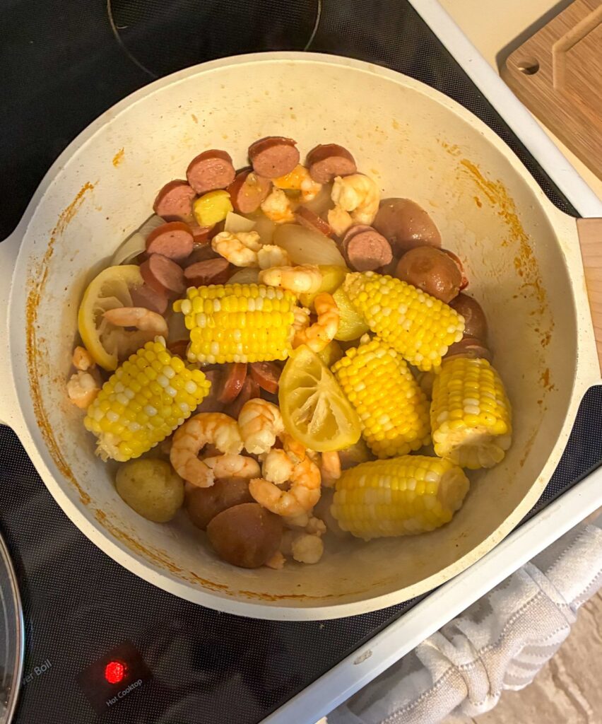 Large pot full of cooked seafood boil