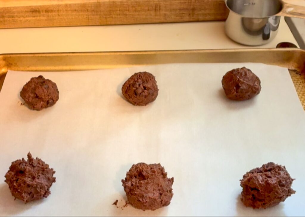 Eggless double chocolate cookies on a baking sheet