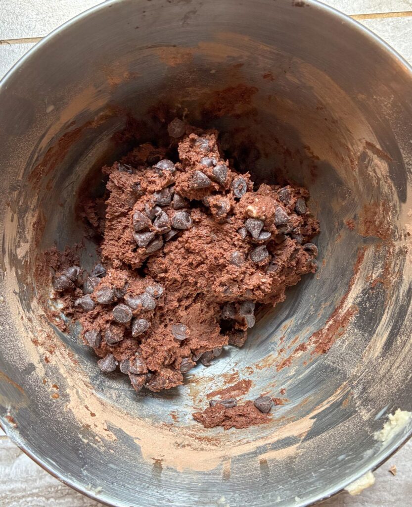 Eggless double chocolate cookie batter in a large bowl