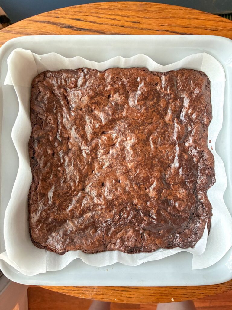 cooked brownies in the baking pan fresh out of the oven