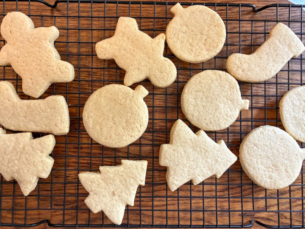 cut out sugar cookies on a cooling wrack