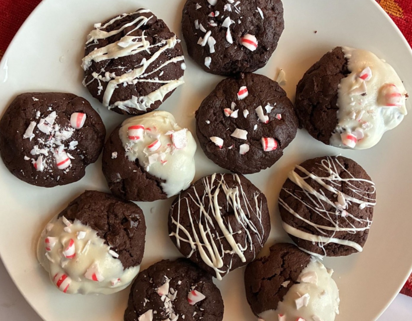 Eggless peppermint chocolate cookies of various designs on a plate