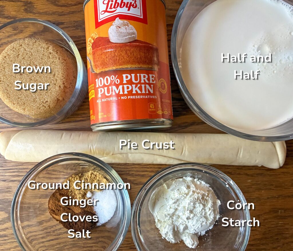 All ingredients in individual glass bowls with labels on them and can of Libby's pumpkin pie