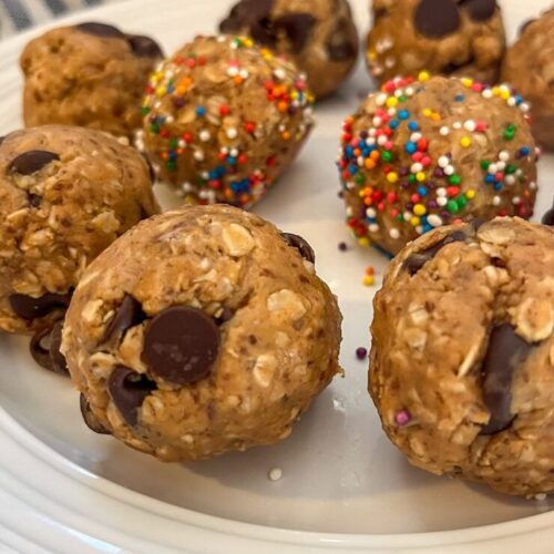 protein balls with sunflower butter on a plate