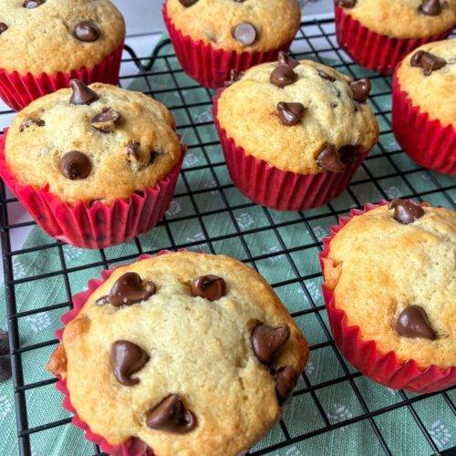 eggless chocolate chip muffins on a drying wrack