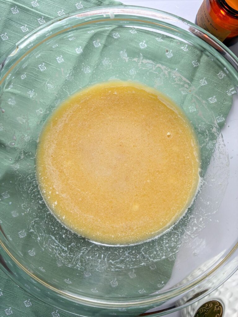 Wet ingredients mixed in a bowl for eggless chocolate chip muffins