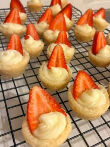 Sugar cookie mini tarts on a cooling rack