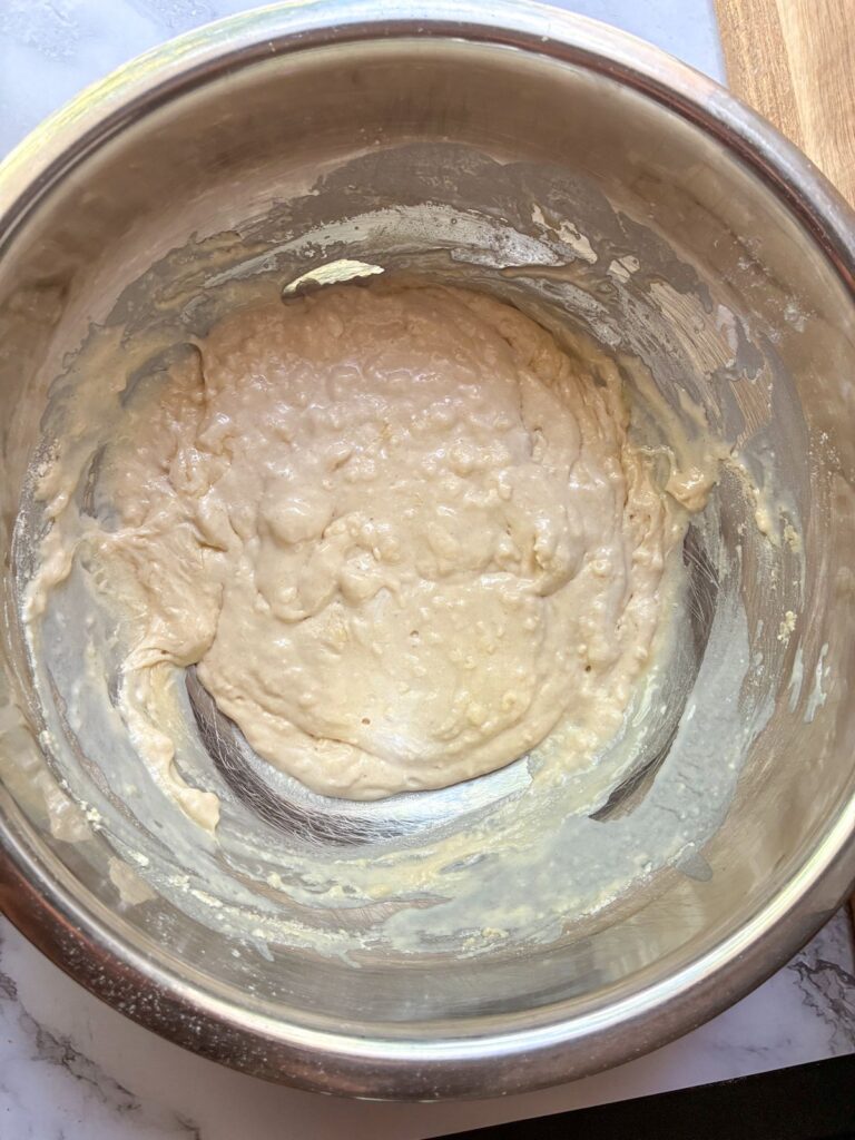 Eggless protein pancake batter in a large bowl