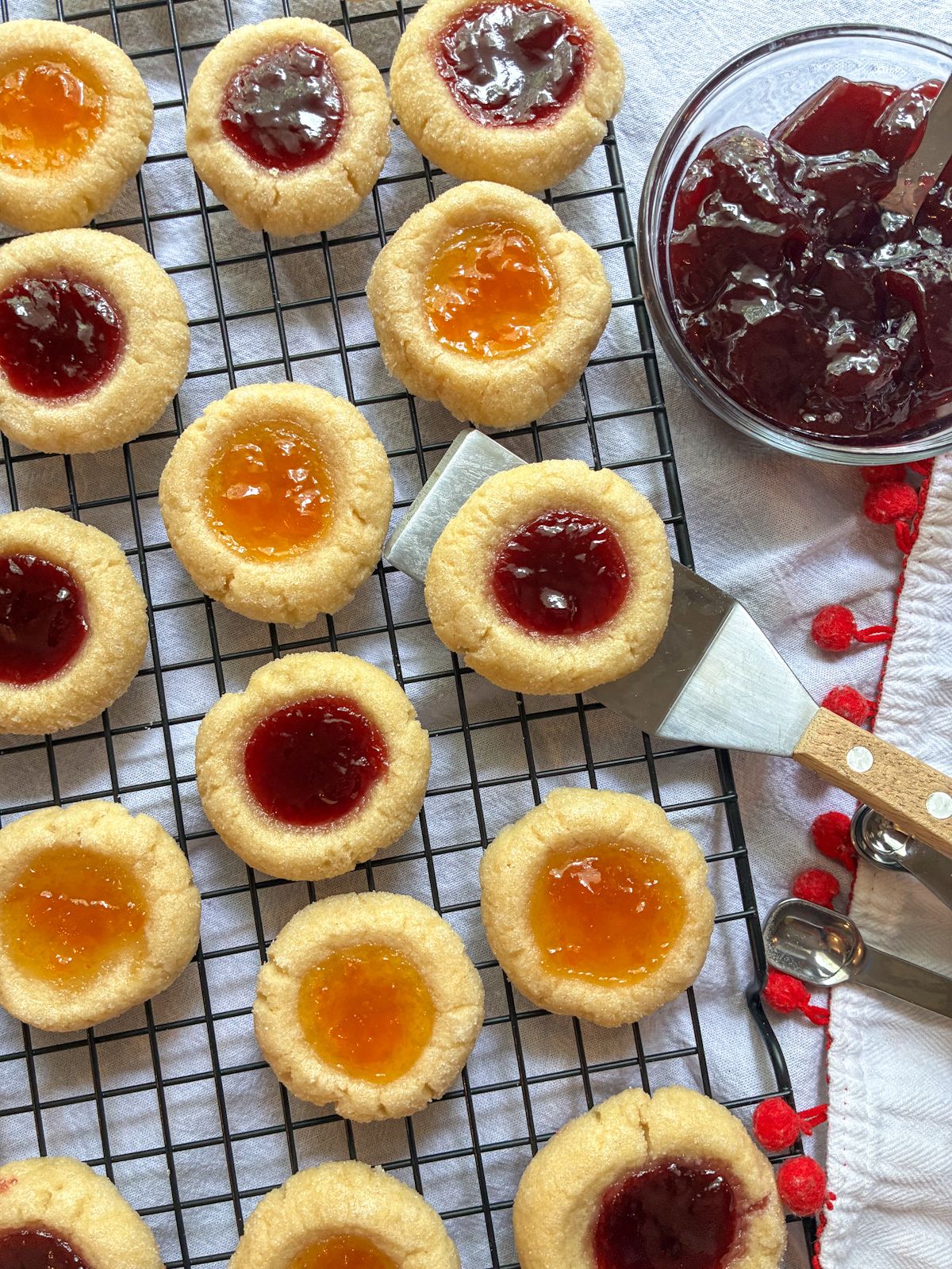 eggless thumb print cookies on a cooling rack