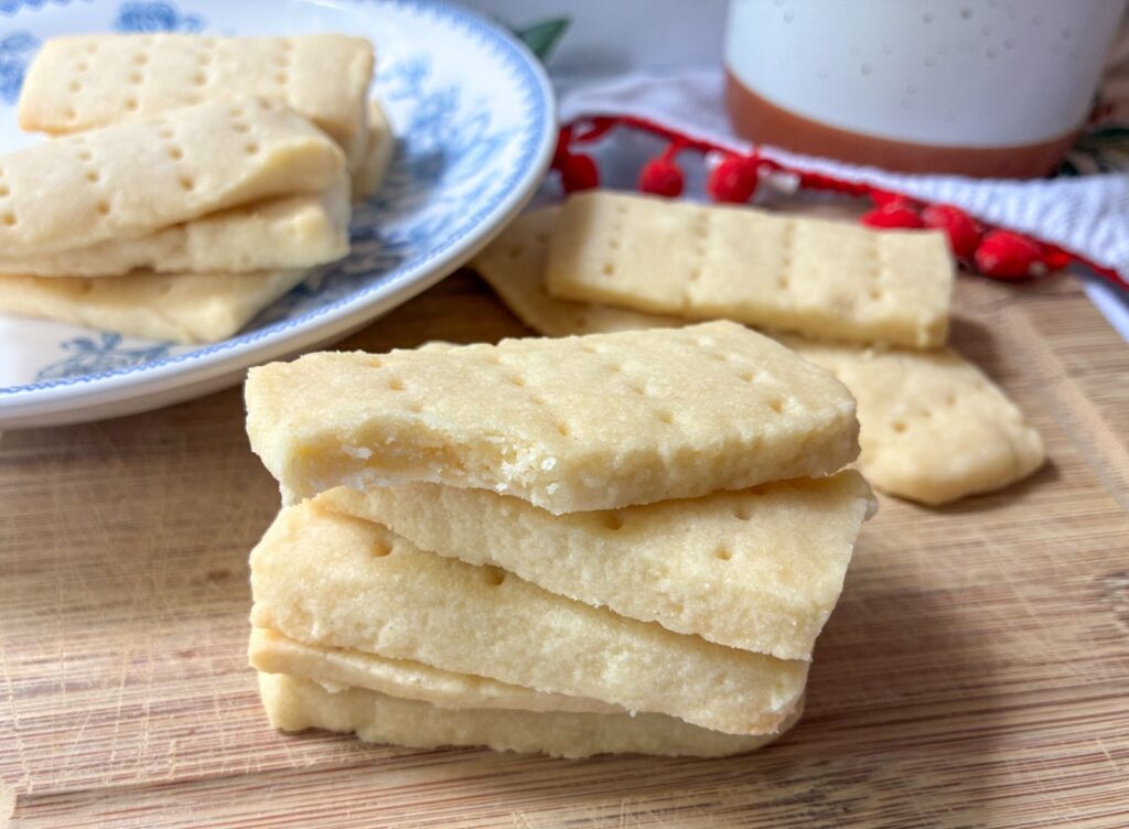 Shortbread cookies on a display on cutting board and plate