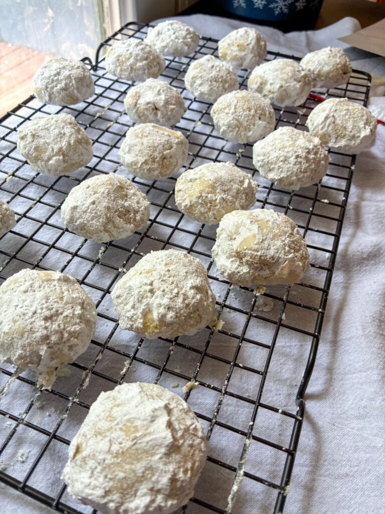 snowball cookies without nuts on a cooling rack