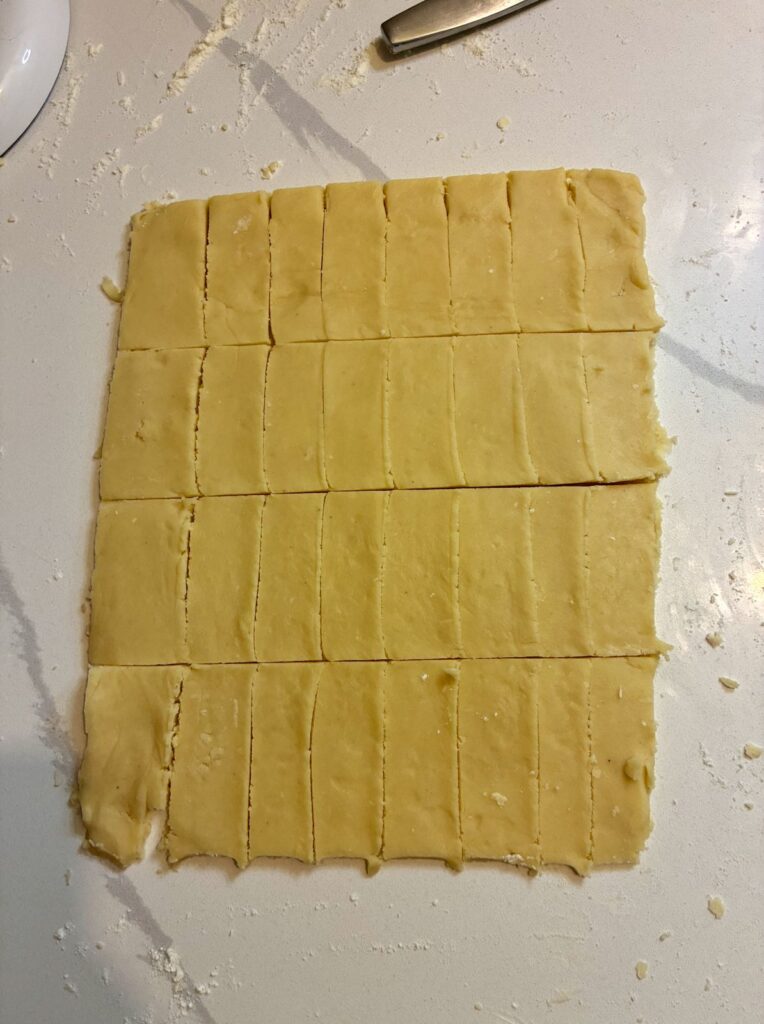 shortbread dough rolled and sliced