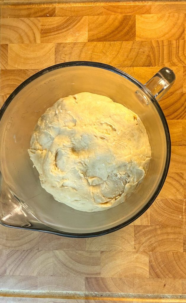 eggless cinnamon roll in a large bowl