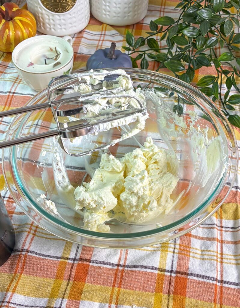 cream cheese frosting in a large bowl