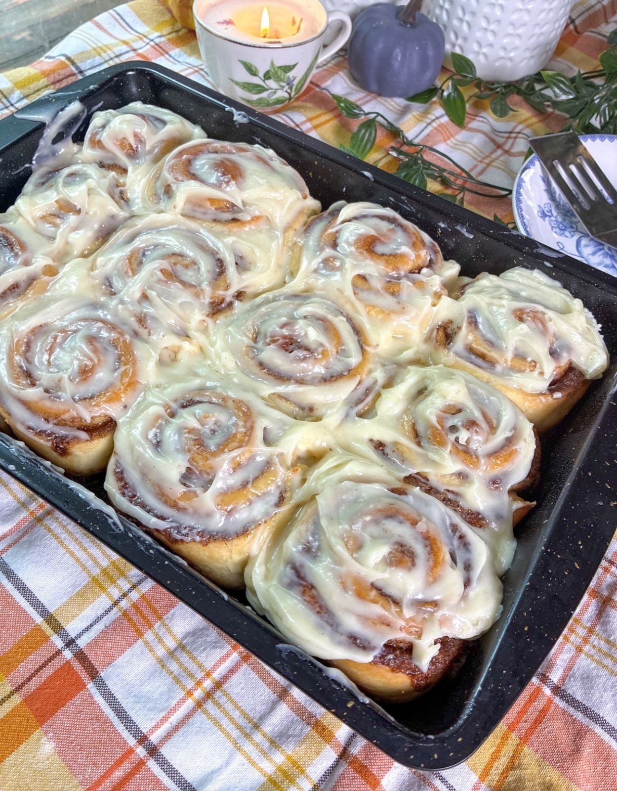 eggless cinnamon rolls in a baking pan